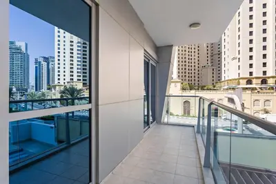a balcony with a view of a city at 3-5 mins walk to JBR 5-7 mins to the tram in Dubai