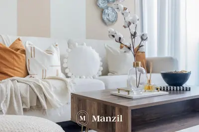 a living room with a coffee table and a couch at Elegant 3BR in a Prime Location Near Metro, Business Bay in Dubai