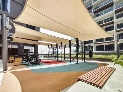 a playground in a building with a building at Stylish studio next to canal in Dubai