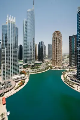 an aerial view of a city with a river at Luxury studio at JLT near metro in Dubai