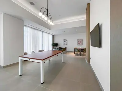 a dining room with a table and chairs at Silkhaus Opera district in Downtown new tower with pool & gym in Dubai