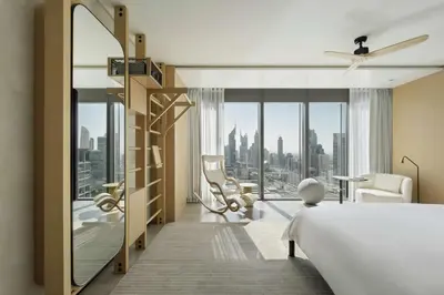 a bedroom with a bed and a view of the city at SIRO One Za'abeel in Dubai