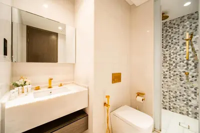 a bathroom with a sink and a toilet at Five Palm Super Luxury Apt with Full Sea Views in Dubai