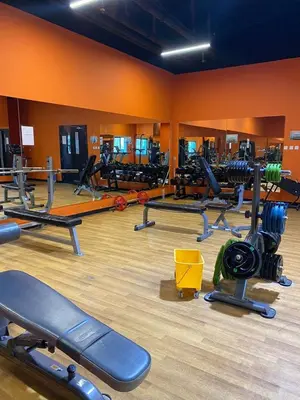 a gym with a bunch of cardio equipment in a room at Spacious Studio Apartment in Dubai Marina with Balcony in Dubai