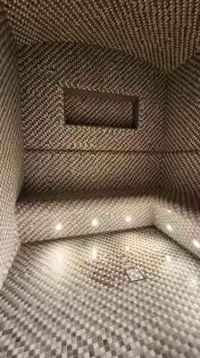 a bathroom with a shower with a tiled floor at STAY BY LATINEM Luxury 1BR Holiday Home CVR A703 near Burj Khalifa in Dubai