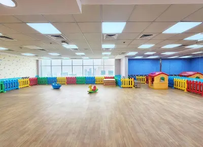 a large room with brightly colored play equipment in it at RH- Studio Retreat, Walk away to Burj Khalifa and Dubai Mall in Dubai