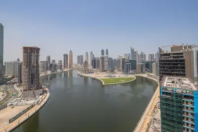 a view of a river in a city with buildings at Frank Porter - Prive A in Dubai