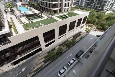 an aerial view of a building with a street at Serenity Studio in Dubai