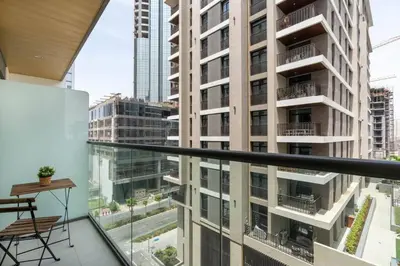 a balcony with a view of a tall building at Serenity Studio in Dubai