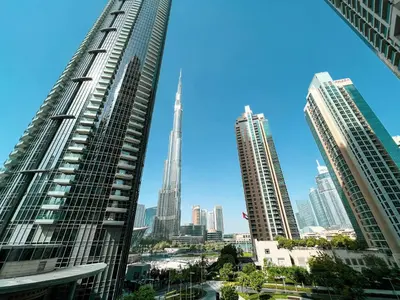 a view of a city skyline with skyscrapers at HomesGetaway -Lavish 1BR in ACT One Downtown Dubai in Dubai