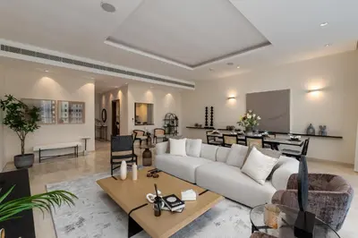 a living room with a couch and a table at Oceana Residences, Oceana Palm Jumeirah - Mint Stay in Dubai