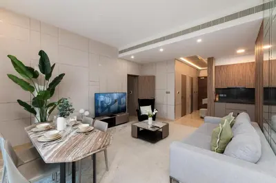 a living room with a couch and a table at Oceana Residences, Oceana Palm Jumeirah - Mint Stay in Dubai