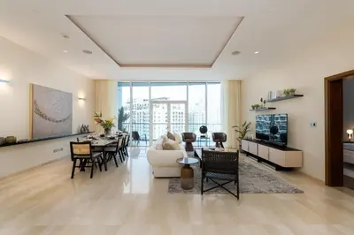 a living room with a couch and a table at Oceana Residences, Oceana Palm Jumeirah - Mint Stay in Dubai