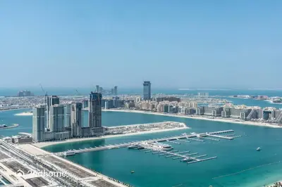 an aerial view of a city with a marina at Seaside Splendor The Palm's Breathtaking View in Dubai
