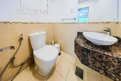 a bathroom with a toilet and a sink at Jumeirah Beach Residence - Bahar 6, Dubai Marina in Dubai