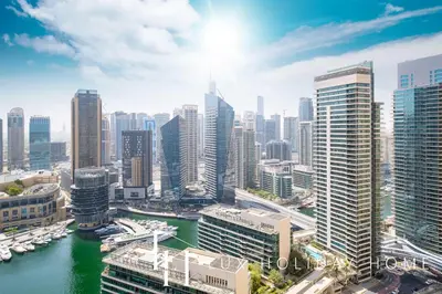 a view of a city with a river and buildings at LUX The JBR Marina View Suite 2 in Dubai