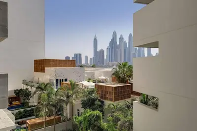 an aerial view of a city with buildings and palm trees at FIVE Palm North Residences - Spectacular Three Bedroom in Dubai
