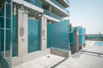 a glass door on the side of a building at The Elite Apartment in Dubai