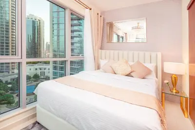 a bedroom with a bed and a large window at Elite Royal Apartment - Full Burj Khalifa & Fountain View - Luxurious - Largest Layout - Melchior in Dubai