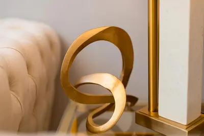 a wooden object with a handle on a table at Elite Royal Apartment - Full Burj Khalifa & Fountain View - Luxurious - Largest Layout - Melchior in Dubai