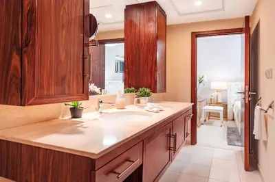 a bathroom with a sink and a large mirror at Elite Royal Apartment - Full Burj Khalifa & Fountain View - Luxurious - Largest Layout - Melchior in Dubai