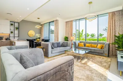 a living room with two couches and a table at New Arabian Dubai Hills villa- 3 BR & Maid Golf Grove With Private pool in Dubai