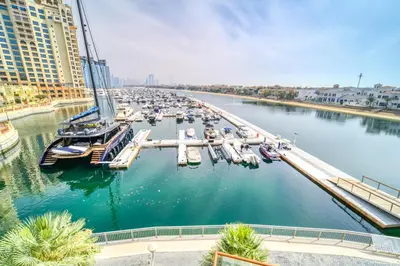 a marina filled with lots of boats in the water at Studio in Palm Views West at Palm Jumeirah by PK Holidays in Dubai