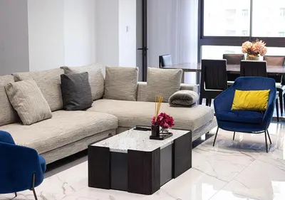a living room with a couch and chairs and a table at Palm Jumeirah Paradise- Luxury,Unveiled in Dubai