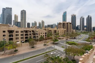 a view of a city with tall buildings and a street at Spacious 2Bedroom with Burj View in Downtown Dubai in Dubai