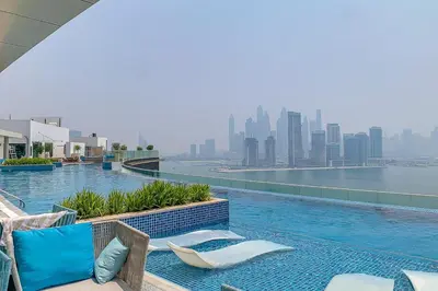 a swimming pool on top of a building with a city skyline at Frank Porter - Seven Hotel & Aprtments in Dubai