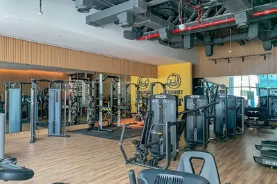 a gym with treadmills and machines in a room at Frank Porter - Seven Hotel & Aprtments in Dubai