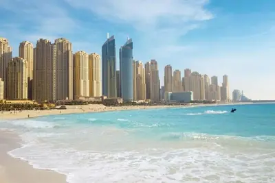 a view of a beach with tall buildings at Shams Beach Front JBR apartments by HAPPY SEASON in Dubai