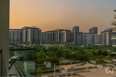 a view of a city skyline with tall buildings at Oraya - Stunning 2BR- Mulberry Dubai Hills, Pool-Park view in Dubai
