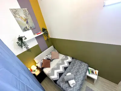 a small bedroom with a bed in a room at Double window Partition Room in Tecom Near Metro in Dubai