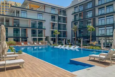 an image of a swimming pool at a building at Frank Porter - Oxford 212 in Dubai