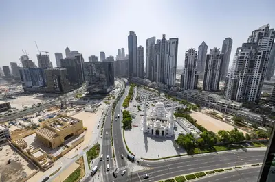 an aerial view of a city with tall buildings at Spacious Studio in Downtown I 8 Boulevard Walk in Dubai