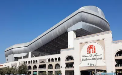 a large building with a sign on the front of it at Best Closed Partition Room in Al Barsha-1 Near MOE Metro in Dubai