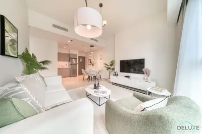 a living room with a couch and a table at Sumptuous 1BR at Act One Act Two Tower 1 Downtown Dubai by Deluxe Holiday Homes in Dubai