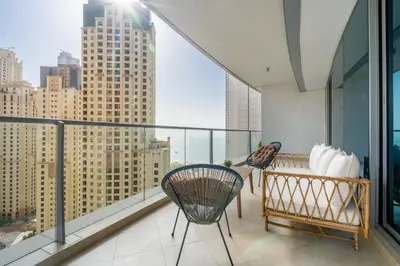 a balcony with a view of a city skyline at GuestReady - Lux home with sea view balcony in Dubai