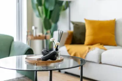 a living room with a coffee table and a couch at GuestReady - Lux home with sea view balcony in Dubai