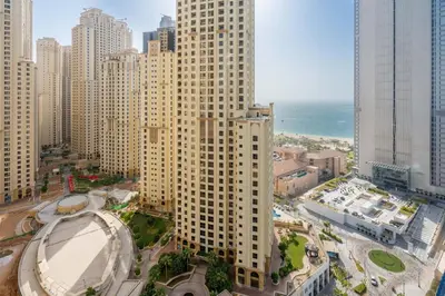 an aerial view of a large building in a city at GuestReady - Lux home with sea view balcony in Dubai
