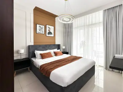 a bedroom with a large bed and a large window at Trophy - Cityscape Posh Suite in Dubai