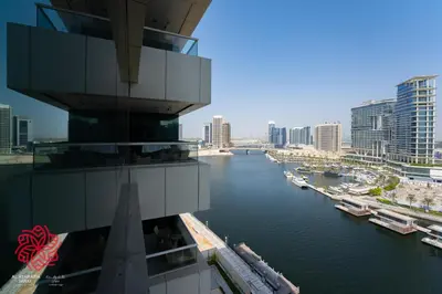 a view of a river in a city with buildings at Alashrafia Saray- Waterfront 3 BDR apartment Business Bay in Dubai