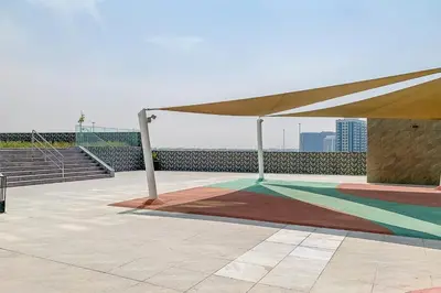 a tent on top of a building with stairs at Frank Porter - Square Tower in Dubai