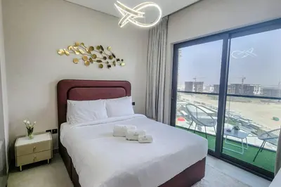 a bedroom with a large bed and a large window at STAY BY LATINEM Luxury 1BR Holiday Home W1006 near Burj Khalifa in Dubai