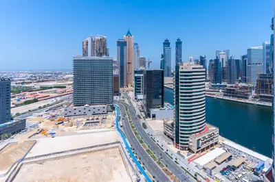 an aerial view of a city with skyscrapers at Elegant Studio in City Center with Balcony in Dubai