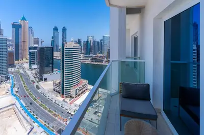 a balcony with a view of a city at Elegant Studio in City Center with Balcony in Dubai