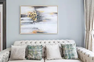 a living room with a white couch with pillows at StoneTree - Modern 1BR near Dubai Marina Mall in Dubai