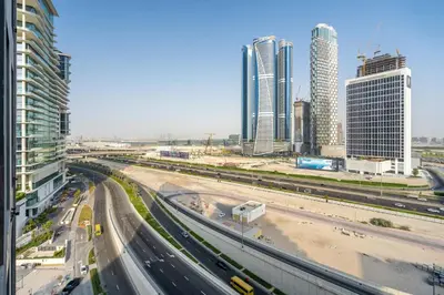 a view of a city with a highway and buildings at GuestReady - Lux comfort in Business Bay in Dubai