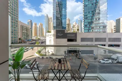 a view of a city from a balcony at West Avenue - Chic One Bedroom in Dubai